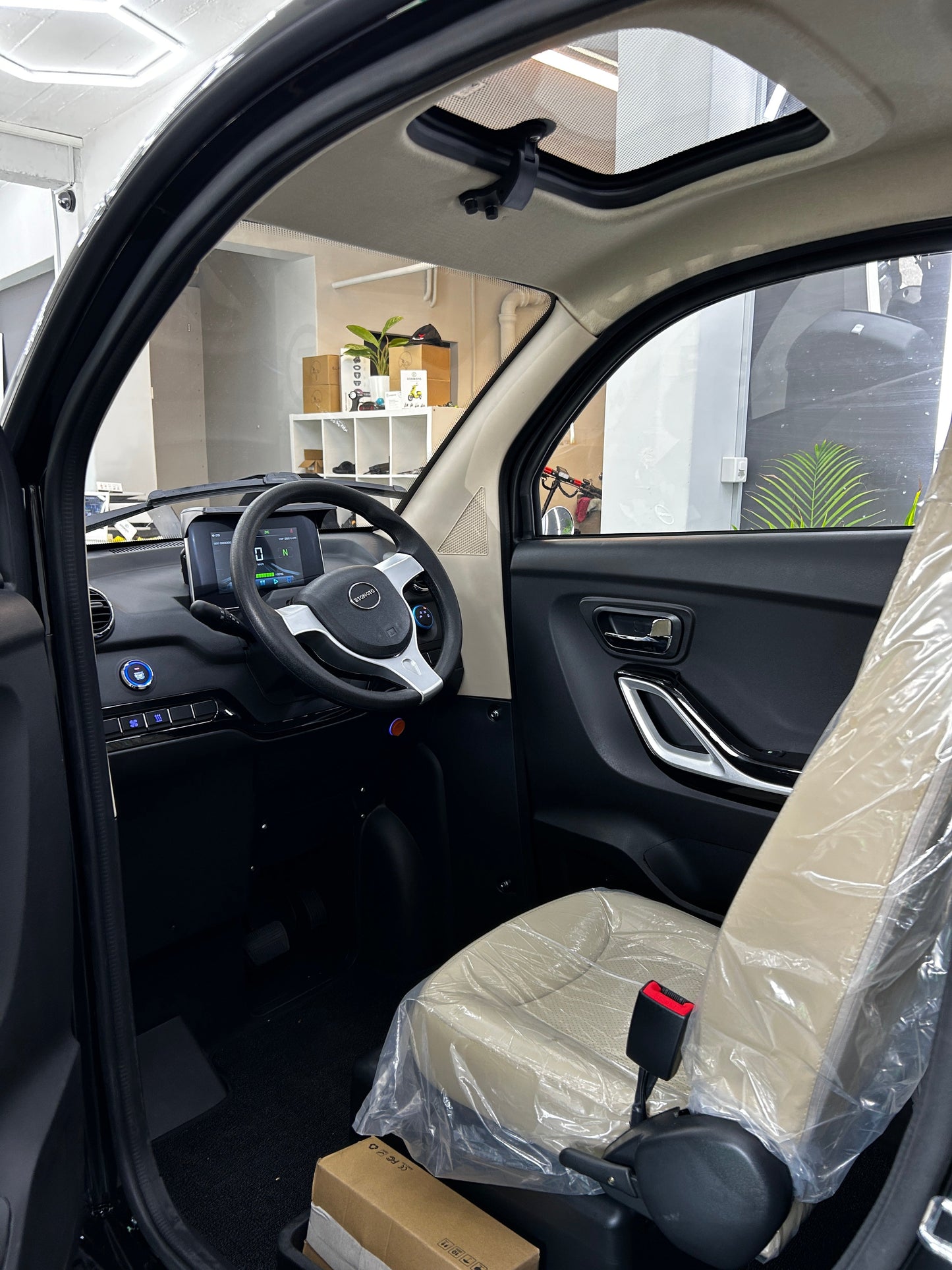 Esomoto I-Tango Elektromobil [Lenkrad]