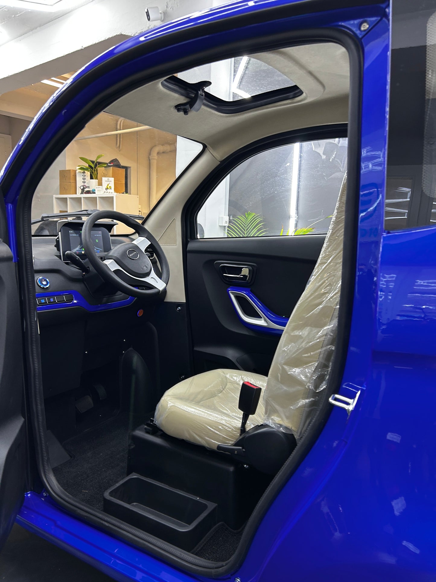 Esomoto I-Tango Elektromobil [Lenkrad]